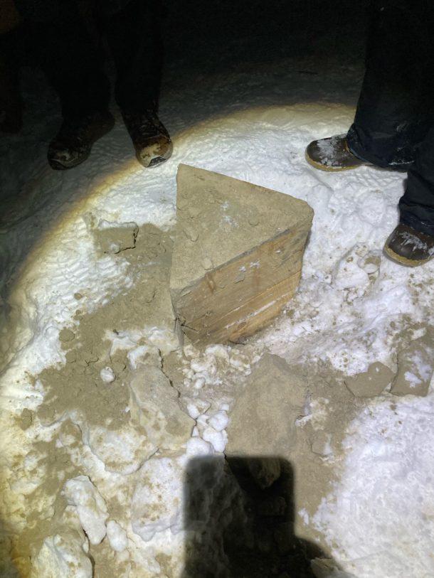 After dark Wednesday, Peter Borden investigated reports that the monolith had been taken away. He found only the base of the structure, sand and footprints. Photo courtesy of Peter Borden